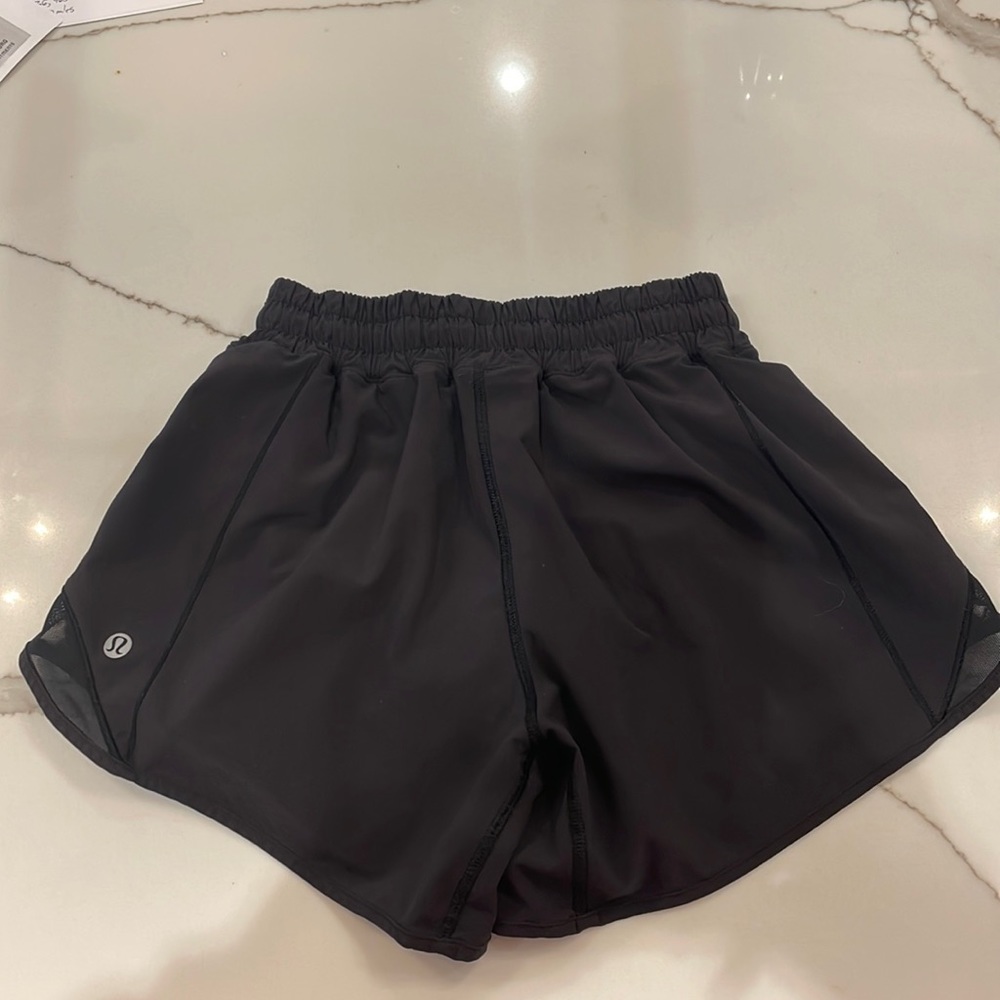 Lululemon Hotty Hot, size 2 tall, lined. Black. Perfect condition!